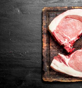 hema-farms-butchery-shop-raw-pork-steaks-cutting-board-black-chalkboard